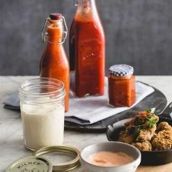 Kilner Swing Top Square Glass Bottle | 8.25oz -Dinnerware Sales kilner clip top 9 ounce square bottle lifestyle