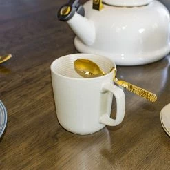 Everything Kitchens Modern Colorful Neutrals - Rippled 12oz Mugs (Set Of 4) - Matte | Ivory 10 Everything Kitchens Modern Colorful Neutrals - Rippled 12oz Mugs (Set Of 4) - Matte | Ivory -Dinnerware Sales rippled lifestyle squares 0003 ek modern ripple lifestyles 3055