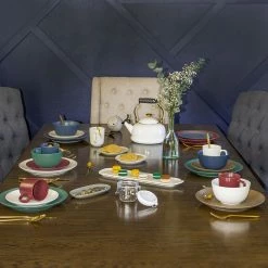 Everything Kitchens Modern Colorful Neutrals - Rippled 6" Bowls (Set Of 4) - Matte | Charcoal -Dinnerware Sales rippled lifestyle squares 0011 ek modern ripple lifestyles 3026 1 3